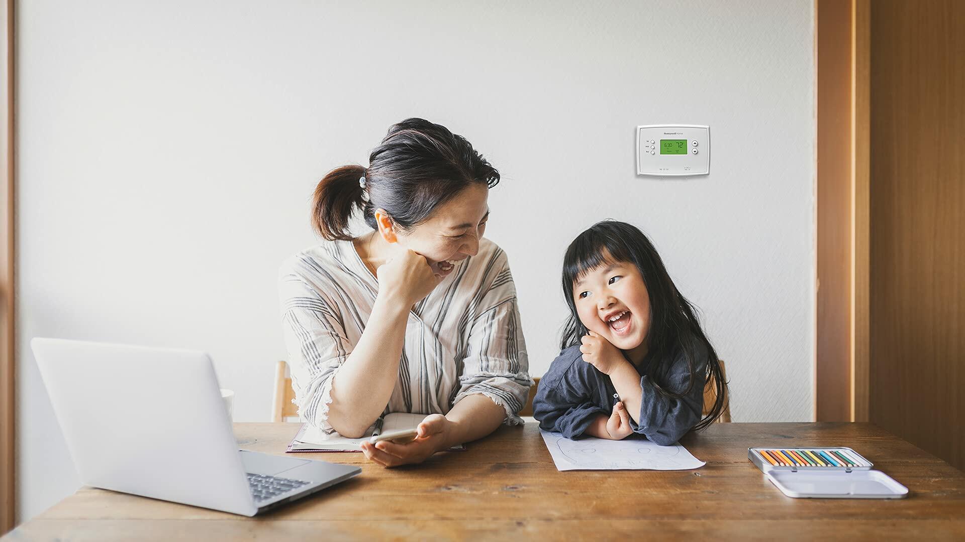 Honeywell Home RTH2300B1038 5-2 Day Programmable Thermostat, White